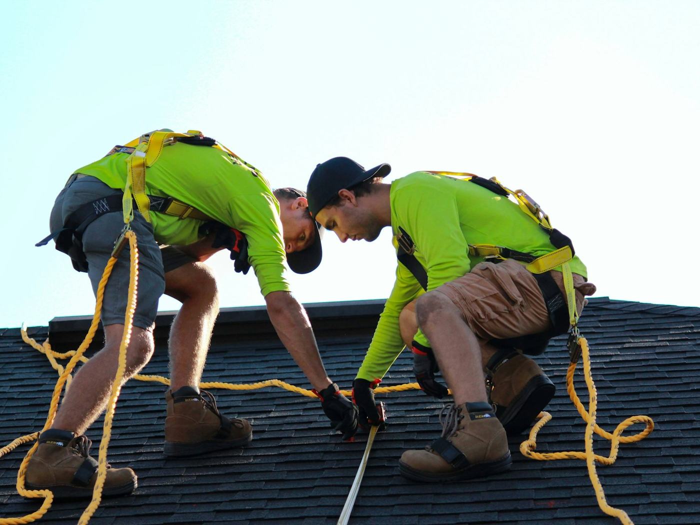 Trident crew and adjuster reviewing a roof inspection on a suburban Illinois home